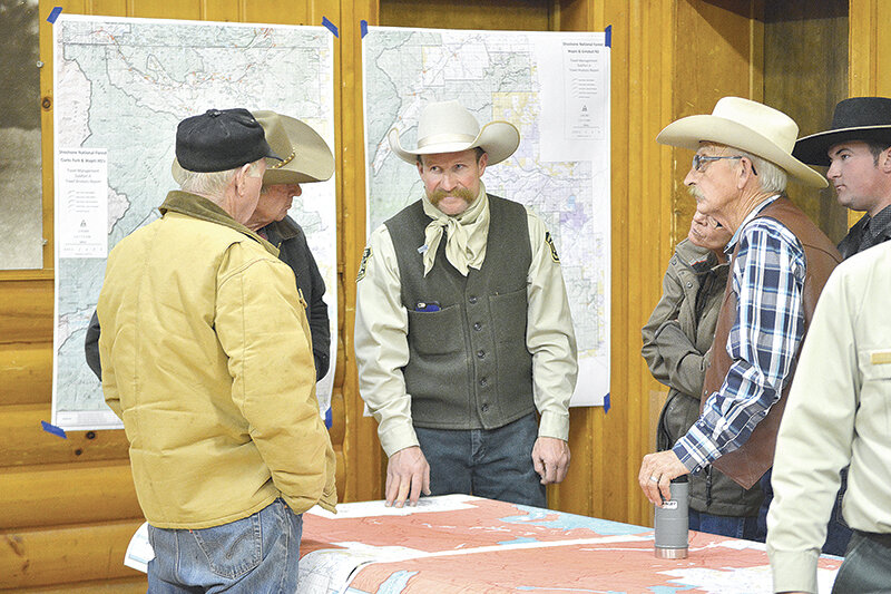Then Shoshone National Forest Law Enforcement Officer Ron Ostrom visits with members of the public during a 2017 meeting in Cody. Last week, a jury convicted Ostrom of six felony charges, finding he lied to his supervisors and kept a government horse when he retired in 2021.