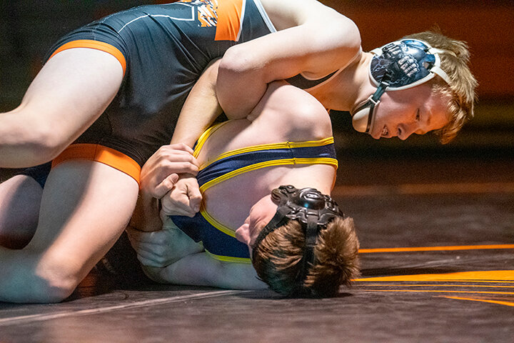 Tyler Wenzel, top, works to turn Greybull&rsquo;s Sy Schlattman last week at the Panther&rsquo;s last home dual before winter break. Wenzel won by pin over Schlattman in 54 seconds. The Panther wrestling squad will travel to Bozeman, Montana, next week for a two-day invitational.