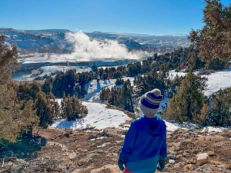 A young hiker overlooks Hot Springs State Park during the annual First Day Hike.