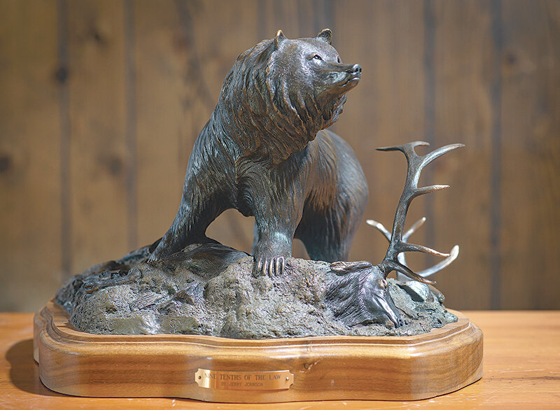 A bronze sculpture of a grizzly bear defending his food cache by Powell resident Jerry Johnson titled &lsquo;Nine Tenths of the Law&rsquo; is one of the artist&rsquo;s personal favorites. Much of Johnson&rsquo;s art was inspired by his many extended trips to the mountains as a guide and on trips to find resources for his varied styles of art.