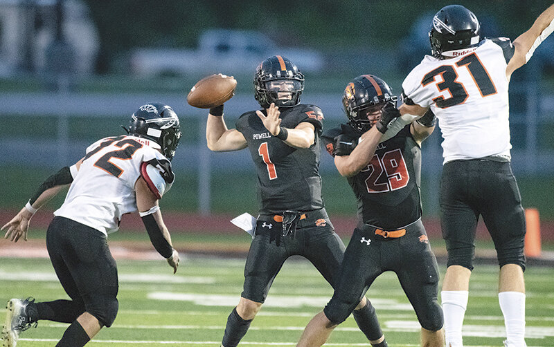 Jhett Schwahn made it official after serving as the varsity quarterback for the Powell Panthers the past three seasons, signing to continue his football career at the collegiate level.
