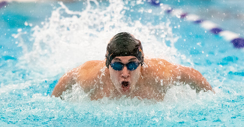Will Fuller rises out of the water during the 200 medley relay in Powell last week. Fuller and the Panthers head to Gillette on Friday to take part in the conference meet on Friday and Saturday.