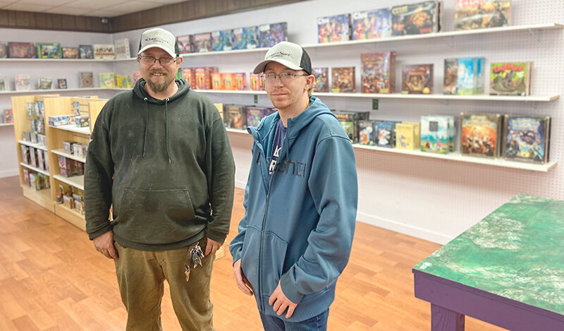 Kurt Bullinger (left) and Justin Vanderpool own Broken Sword Games, a game store that opened recently on North Clark Street and offers card and board games, accessories and places to play.