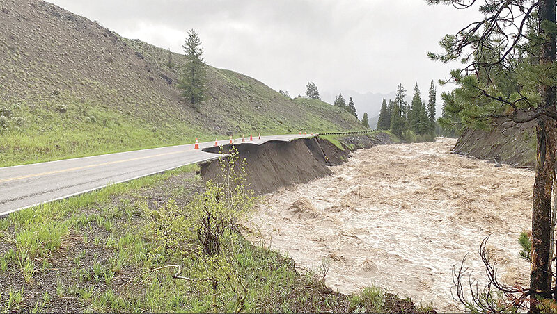 High water levels in the Lamar River erode the Northeast Entrance Road during the June 13, 2022 flood in Yellowstone National Park.