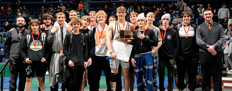 The Powell Panthers pose with their trophy after placing fourth at the state tournament in Casper. From left: Coach Cody Kalberer, Wyatt Nicholson, Jonathan Harms, Cody Seifert, Doug Bettger (behind), Talon Nuss, Mitchel Wainscott, Wyatt Heffington (behind), McKale Foley, Patrick Haney (behind), Jimmy Dees, Jacob Eaton (behind), Gabriel Whiting, Tyler Wenzel, Chevy Hill, Dusty Carter and coach Nick Fulton. Jeremy Harms and coach Juston Carter are not pictured.