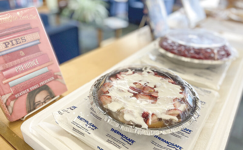 The Powell Library held its second annual Pi Day pie fundraiser Thursday, as local bakers brought in seven pies to be auctioned off with funds going to support the construction of a new library building.