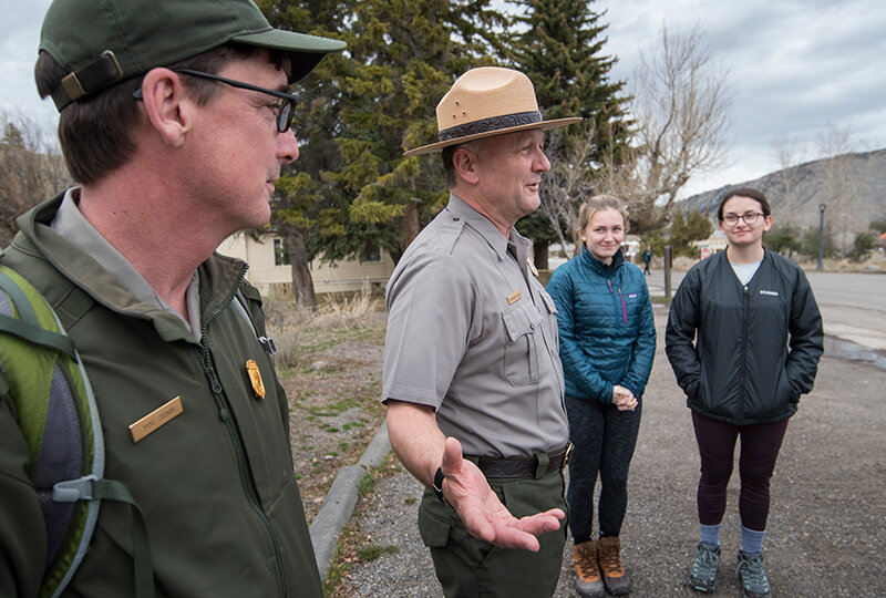 Yellowstone National Park Superintendent Cam Sholly interacts with visitors from New York and park employee Mike Coonan. The American Forests has recognized  Sholly as its 2023 Forest Resilience Champion Award recipient.