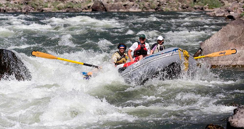 Since opening as a small operation in Sinks Canyon, NOLS has grown its offerings to include trips around the world. Here, students raft in Utah.