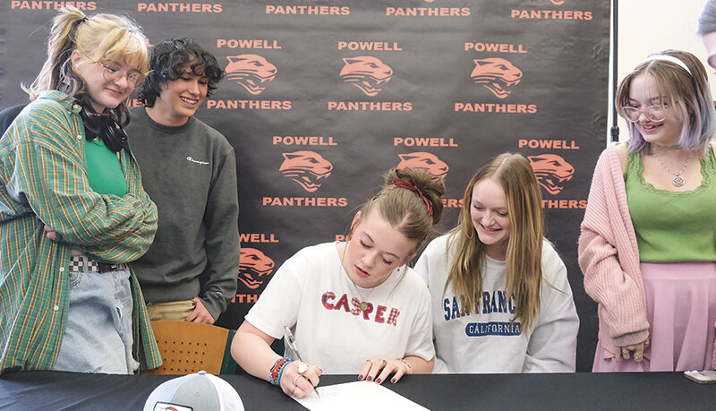 Allie Gilliatt (center) was given a signing ceremony at Powell High School on March 28 surrounded by her family and friends. Gilliatt will be competing with Casper College for speech and debate on an all-tuition-paid scholarship. From left: Powell High School students Geo Dilworth, Mason Coombs, Gilliatt, graduate Liz Peterson and Paige McConnell.