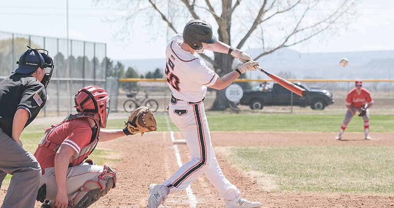 Trey Stenerson swings through a pitch on Sunday as the Pioneers enjoyed a warm opening doubleheader against Lewistown, earning the sweep.