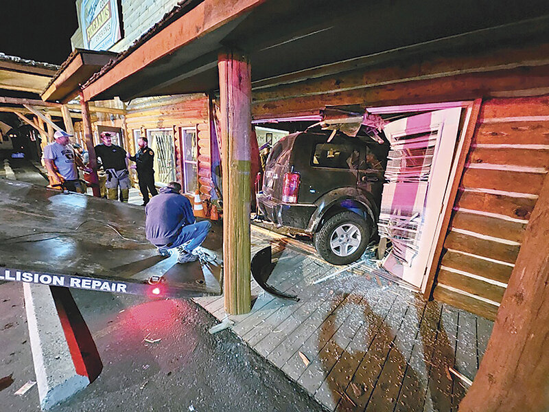A Dodge Nitro SUV had to be towed from inside Cody Firearms Experience on Saturday night, after its allegedly impaired driver crashed through the wall of the building.