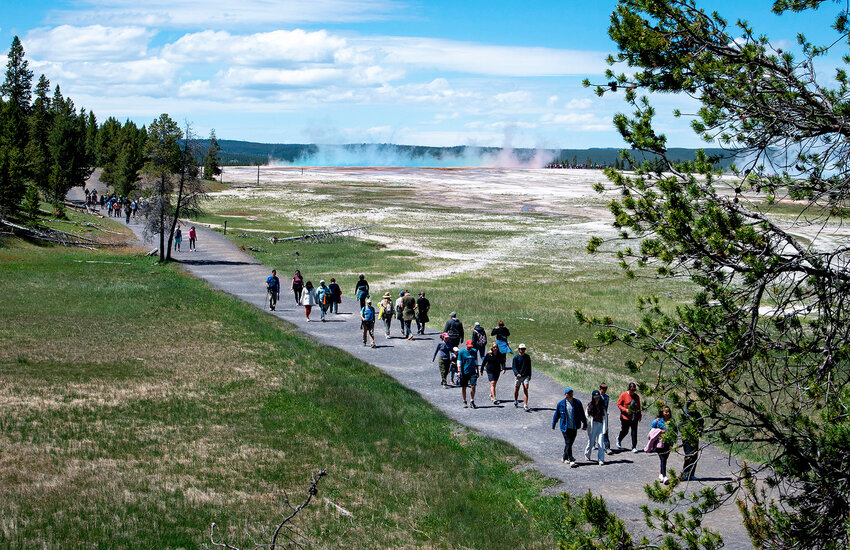 May attendance in Yellowstone National Park was the second highest since attendance data has been collected in the park. In this photo, visitors hike a trail to get a bird&rsquo;s eye view of Grand Prismatic Spring. May attendance was only higher in 2022, just prior to a flood that closed the park briefly and saw two entrances closed for four months. If attendance continues at this pace, it is likely the park will cross the 5 million visits mark for the first time.