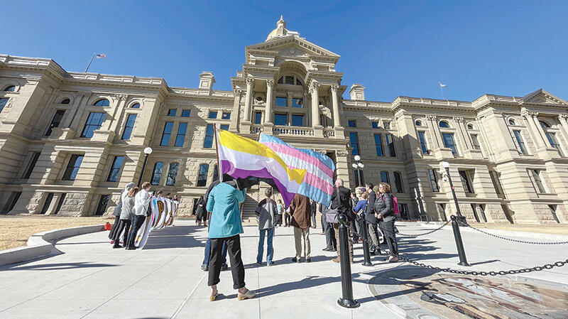 LGBTQ+ advocates gathered outside the Wyoming State Capitol on Feb. 27, 2023.