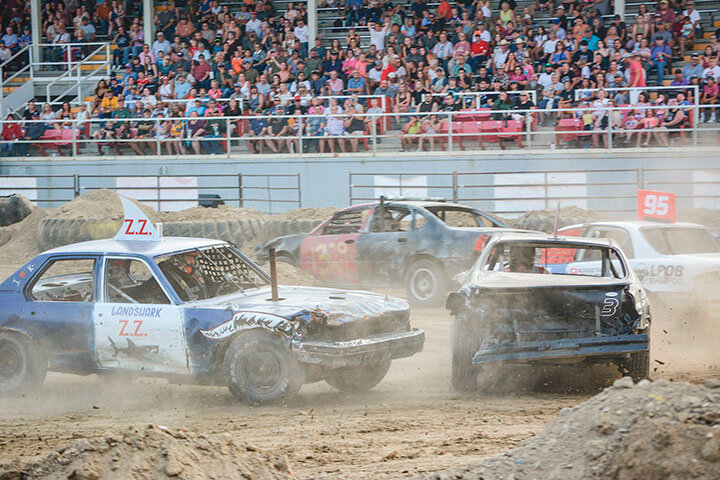 Zac Zier (at left) makes contact with Chris Gemmel (No. 3) during last week&rsquo;s figure 8 race at the Park County Fair. They were among 52 drivers who participated in the July 24 event.