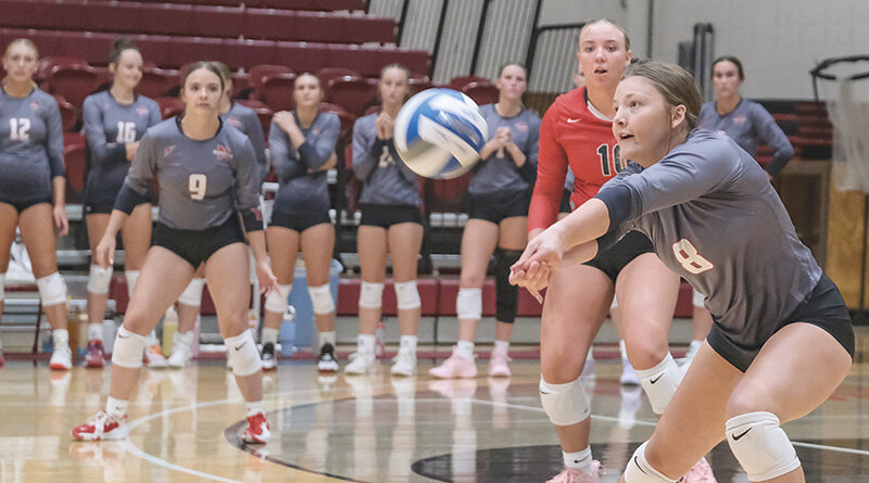 Taylor Wilson slides over to pass a ball during the Trapper volleyball team&rsquo;s season opening victory against Miles Community College last Thursday.