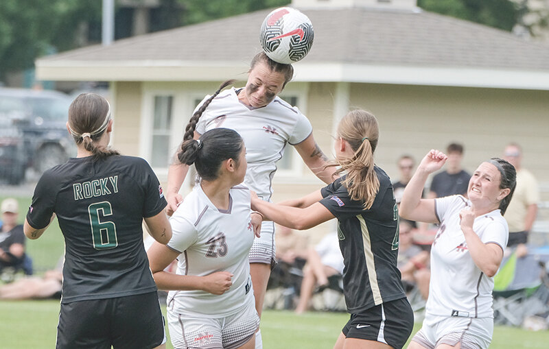Sam Bonar rises up to head a ball during the Trapper&rsquo;s preseason scrimmage against Rocky Mountain College. The Trappers won their season opener on the road against Western Nebraska 3-1.