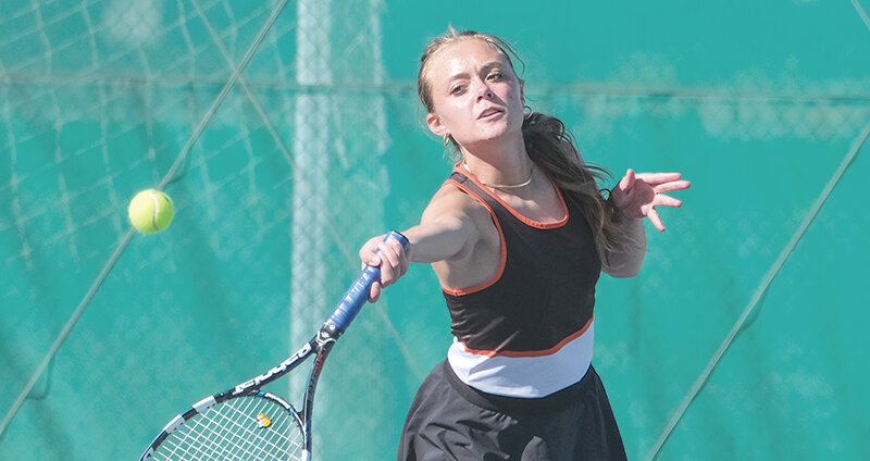 Ava Stearns comes up to play a ball at the net in No. 3 doubles. The Panther girls fell short against Jackson 4-1 on Thursday afternoon.