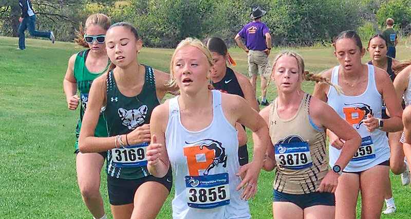 Eleasah Horsley, center, and Shelby Zickefoose, right, proved to be the difference in Montana, placing fifth and sixth for the Panthers, breaking a tie with Hardin.