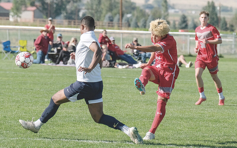 Shota Akima watches his shot fly towards the net during the Trapper’s match against Otero on Saturday. Northwest and Otero played to a scoreless draw in Powell.