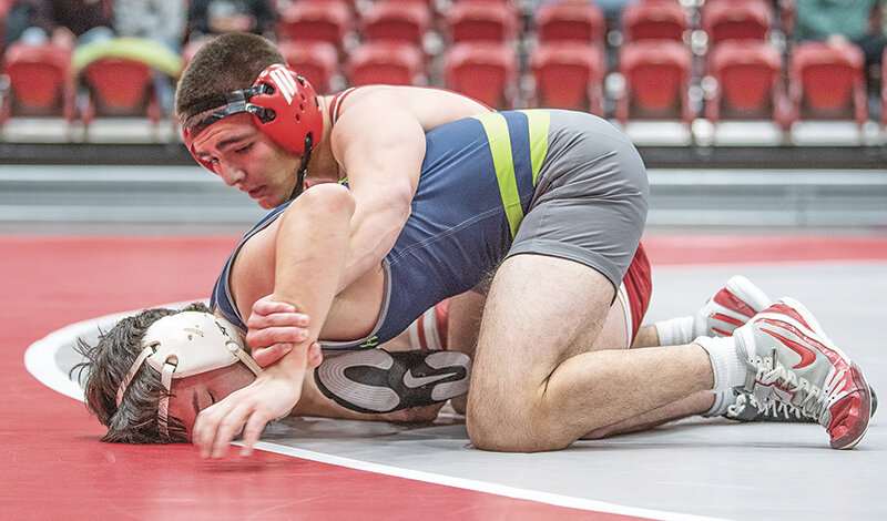 Kaiden Rubash (top) earned a second place finish at the Battle of the Rockies Open in Montana. He is seen here competing during the Trapper&rsquo;s dual against the University of Providence in November.