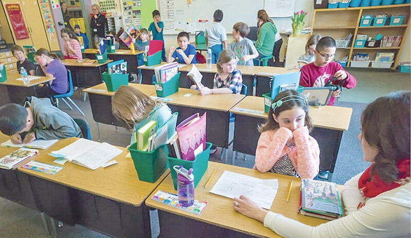 In her third grade class at John Colter Elementary school in Jackson, Natalie Lyon teaches about the theme of a story during a literature exercise in 2017.