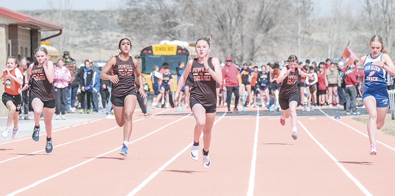 The seventh grade Cubs race down the track during the 100 meter dash at the Burlington Invite on March 29. The Cubs put on another strong performance in Riverton in the sprinting events. From left: Kimber Allan, Karen Richmond, Maci MaGill and Abigail Curdy.