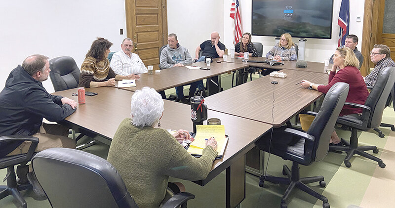 Park County commissioners gathered with city leaders April 10 for the latest of their regular meetings to talk about issues facing all of them and ways to help each other. Clockwise from left: Powell City Administrator Zach Thorington, Cody Mayor Lee Ann Reiter, Meeteetse Mayor Bill Yetter, commissioners Lloyd Thiel, Scott Mangold and Kelly Simone, Commission Chair Dossie Overfield, Commissioner Scott Steward, Cody City Administrator Barry Cook, Meeteetse City Clerk/Treasurer Angie Johnson and Park County Clerk Colleen Renner.