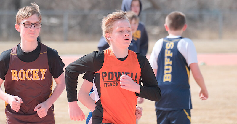 Mason Cheatham keeps his focus during the 1600 meters at the Burlington Invite earlier this season. The Cubs will host their own invitational at Powell High School on Saturday, April 26.