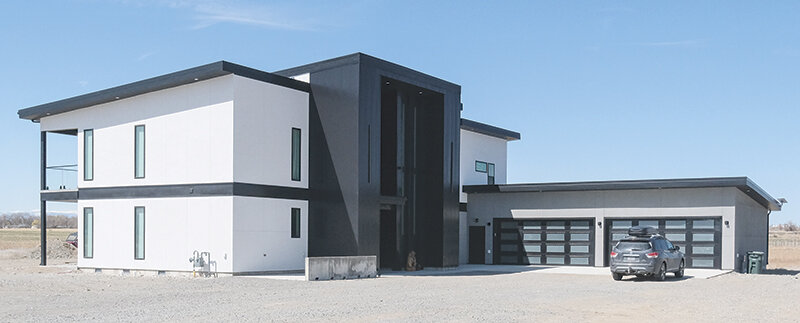 The Tietema home is a combination of the family's past three houses, and a little Pinterest. The modern style home is open and minimalist inside, with some unique touches throughout, including a home theatre for Friday movie nights.