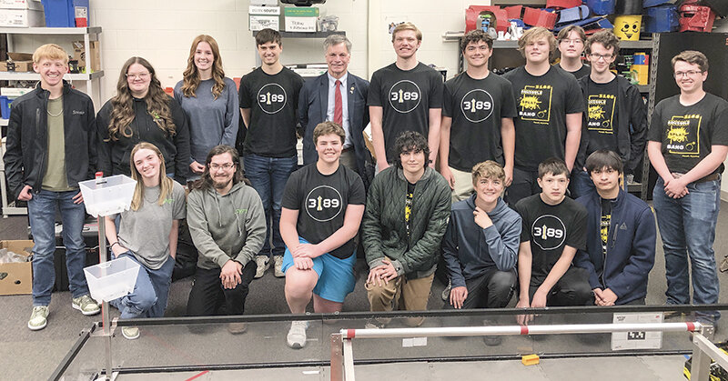 Members of the Powell High School robotics club posed with Gov. Mark Gordon during his visit to Powell schools on May 5. Back row, from left: Brighton Streeter, Isabelle Lobingier, Kate Miller, Alan Crawford, Gov. Gordon, Dallin Waite, Dexter Opps, Isaac Stensing, Jacob Harms, Ethan Cartier and Lukas Legler. Front row: JJ Gardner, Robert Gonzales, Martin Stensing, Mason Coombs, Calvin Opps, Zach Peterson and Elias Brower.
