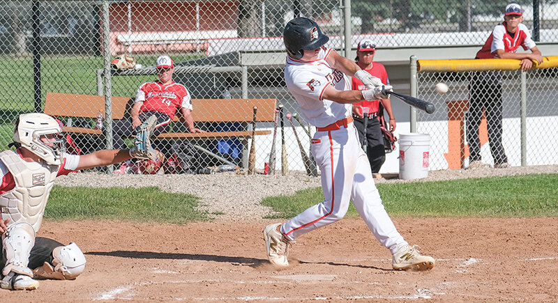 Ben Ostermiller swings through a pitch against Lovell at home. Ostermiller threw a complete game in the Dillon tournament on Friday with eight strikeouts and two walks and hit .529 for the week in Montana.