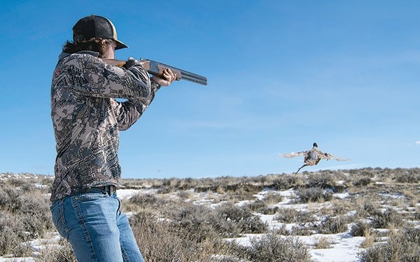 Brayden Polley, a 17-year-old hunter from Cody, harvests a rooster on his first shot of the day during the Big Horn Basin chapter of Pheasants Forever Bob Messier Youth Hunt on Saturday. Polley has attended the event for three years.