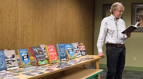 Author Keith McCafferty reads an excerpt from his latest novel, ‘Cold Hearted River,’ on Friday at the Powell Branch Library.