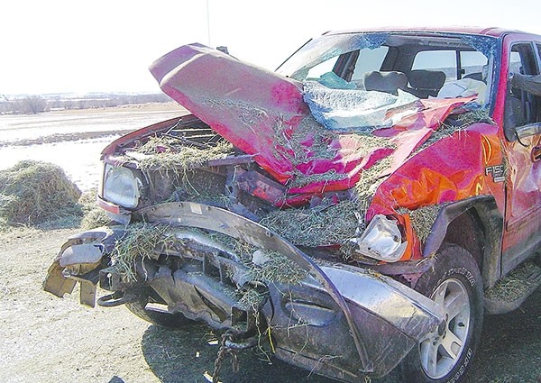 Richard and Bill Schlenker’s truck looked like this after being hit by hay bales in 2010.