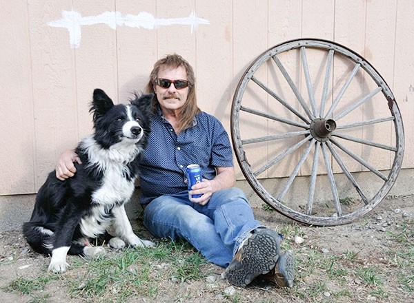 Doug Blough with his dog, Gabriel.