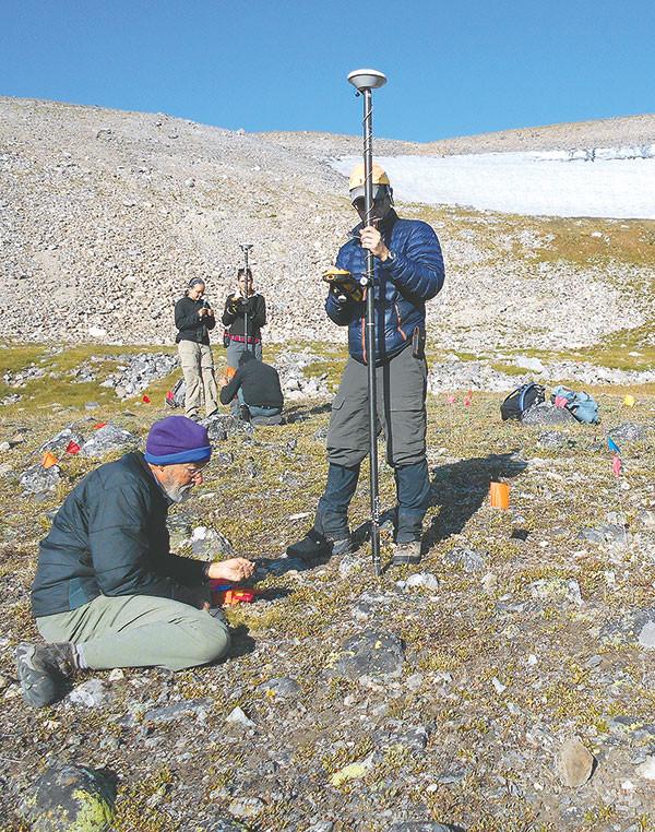 Volunteer Larry Amundson of Lander (left) and archeologist John Laughlin of the Wyoming State Historic Preservation Office (right) conduct GPS work in the Washakie Wilderness of the Shoshone National Forest in this photograph from last summer. Photo courtesy Larry Todd