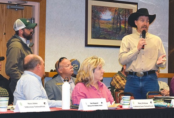 At the Yellowstone Ecosystem Subcommittee of the Interagency Grizzly Bear Committee Thursday in Cody, Lee Livingston (far right), Park County commissioner and Cody outfitter, said the grizzly bear’s recovery has been successful. From left are Luke Ellsbury of the Wyoming Game and Fish Department, Sam Sheppard of Montana Fish, Wildlife and Parks, Bucky Hall of the Park County Commission and Mary Erickson of Custer-Gallatin National Forest in Bozeman, Montana. ‘It’s time for them to be delisted,’ Livingston said.