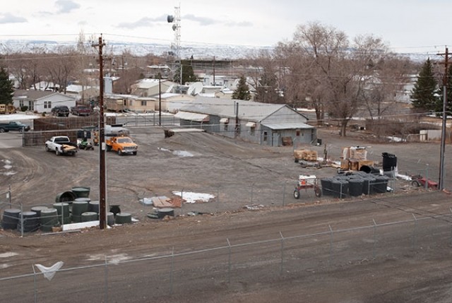 The city is planning to build an enclosed transfer station for garbage on this industrial-zoned property on North Ingalls Street. The land is adjacent to the City Sanitation Department. The old building pictured at right will be torn down. Under the city’s plan, garbage trucks will enter the transfer station from the alley and dump loads into a compaction trailer. When that trailer is full, a truck will exit onto Ingalls Street and haul it to the Cody landfill. The city will contract with a private company to haul the trailer to Cody. Sanitation department employees will operate the transfer station, and the city will not need to hire additional employees, leaders said during an informational meeting Monday.