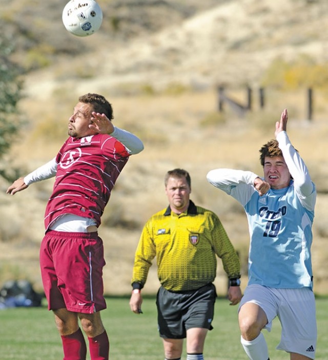 Alan Da Costa goes up for a header during Region IX championship soccer action in Rock Springs on Saturday. The Trappers defeated Otero 2-1 to earn a spot in the district tournament, which will take place in Arizona.
