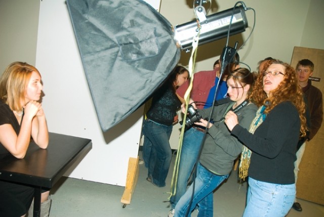 Professional photographer Bobbi Lane (right) teaches area high school students some of the finer points of studio lighting techniques during a workshop at Northwest College on Friday, April 15. Lane shared insight with college and high school students Friday and gave a public presentation Friday night. She provided additional instruction for NWC photography students on Monday.