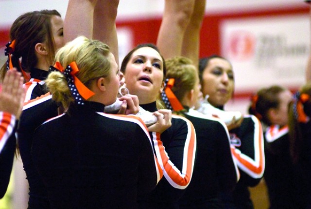 While they fell shy of defending their 2010 state title, the Powell High School cheerleaders, shown here performing at the state basketball tournament, placed third with their stunt routine at state.