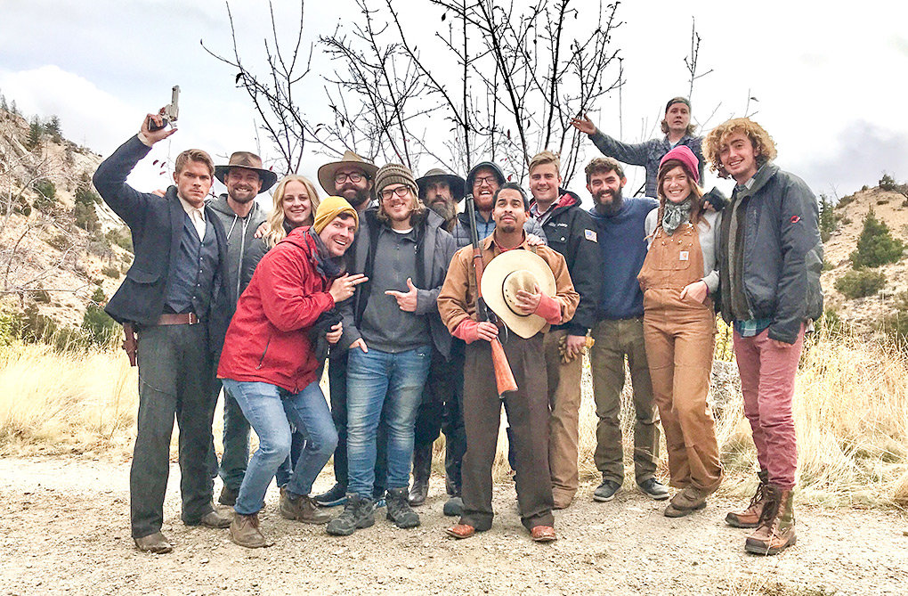 A self-timed iPhone photo captured much of the cast and crew of The Counterfeit Kid (though missing some key members!) at a shooting location near Rattlesnake Mountain. This shot was taken Oct. 10 — Virginia Schmidt’s last day on set. Pictured from left in the back row are Brando White, Matthew Griffith, Stacy Taggart, director Matthew Taggart, Bob Sagers, Cameron Babcock, Thomas Stoddard, Ian Hawkes, Tyson Haslam (in very back), Schmidt and Ollie Rodden. In the front row are Aaron Carling, Ben Haskin and Bryce Fernelius.