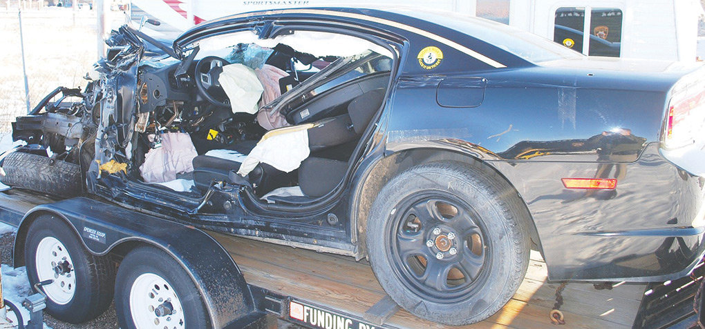 Former Wyoming Highway Patrol Trooper Rodney Miears’ patrol car was severely damaged in a 2015 crash in the Wapiti area. Miears has filed a lawsuit in Wyoming’s federal court against the company that owned and operated the delivery truck that hit him.