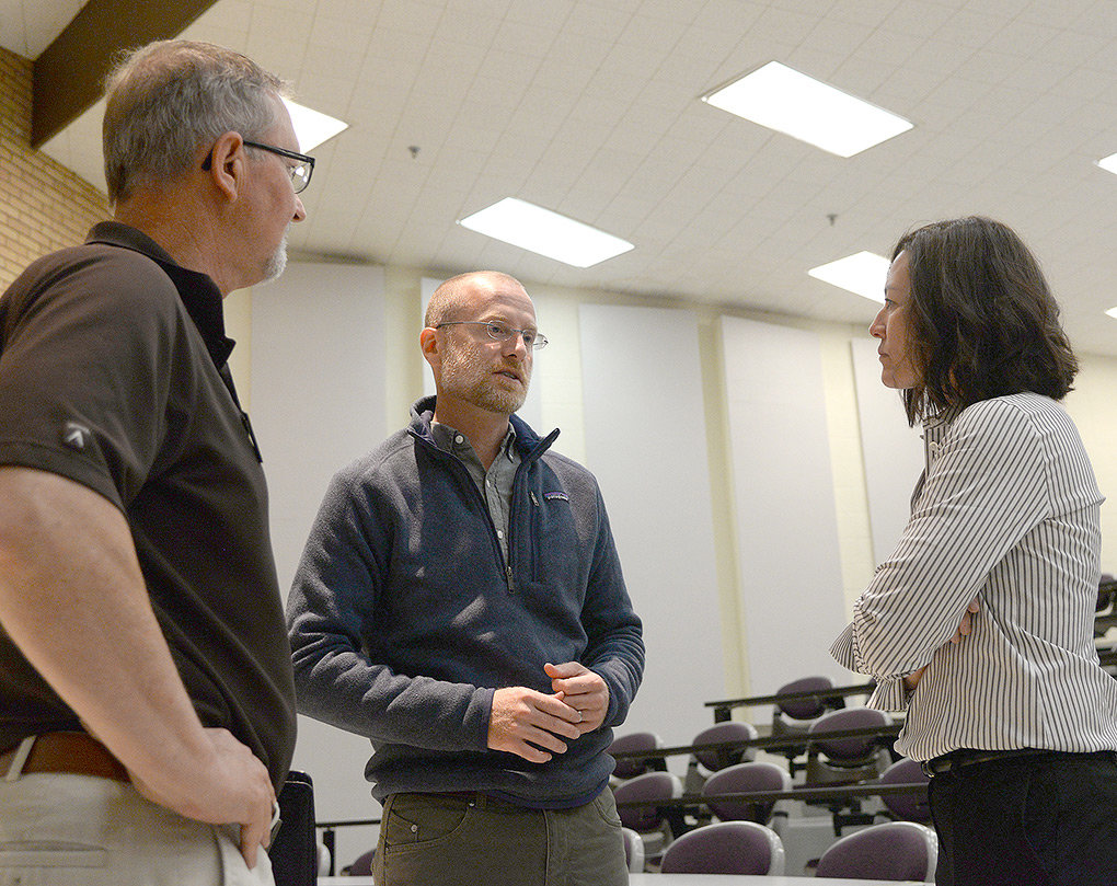 FCC Commissioner Brendan Carr visits with Bruce Morse of the Wyoming Small Business Development Center and Christine Bekes of Powell Economic Partnership following a Thursday talk at Northwest College.