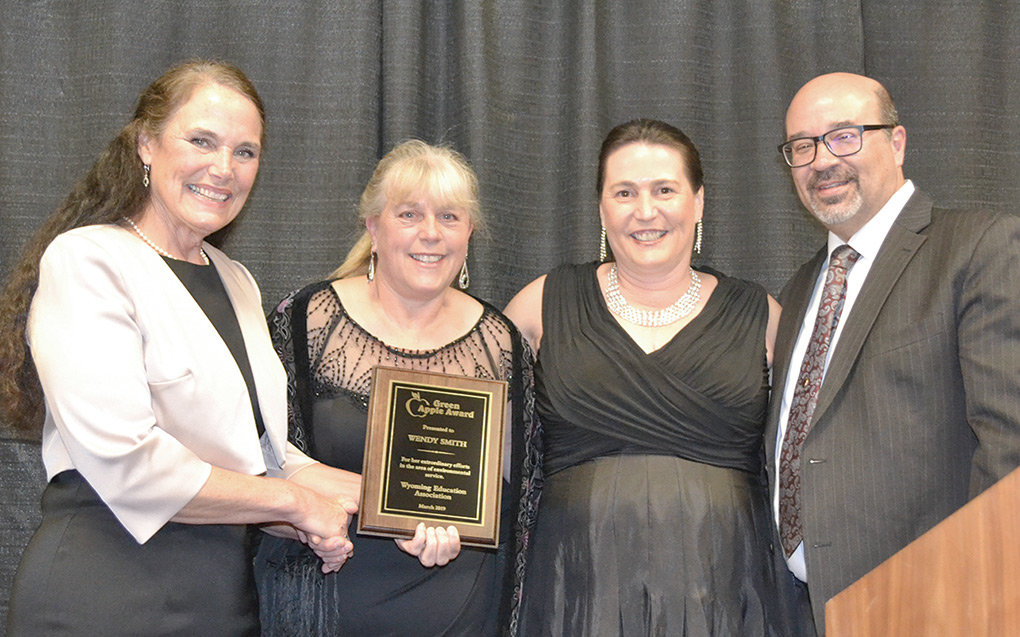 The Wyoming Education Association recently recognized three Powell educators. WEA President Kathy Vetter (left) presents Wendy Smith with the WEA Green Apple Award. Also pictured are local Powell Education Association President Necole Hanks and Northwest Region President John Fabela, who received the National Education Association Foundation for the Improvement of Education Award for Teaching Excellence.