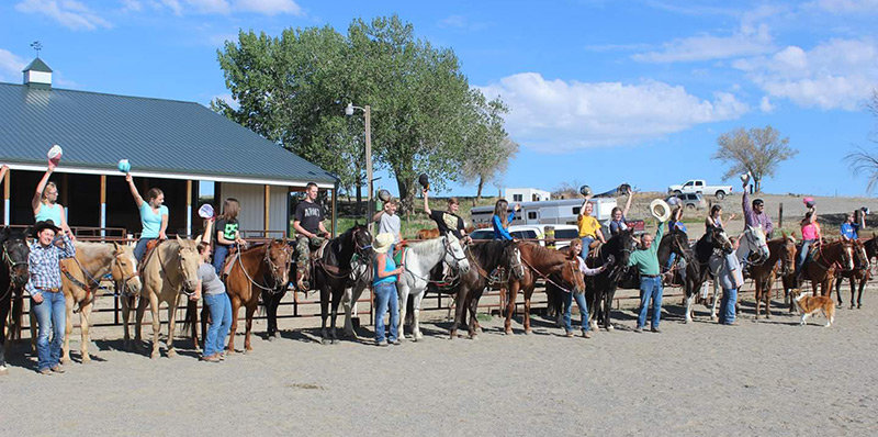 Participants in Camp Wannabe pose for a photo earlier this month. The camp, held in rural Powell, provides local youth an opportunity to learn the basics of horsemanship.