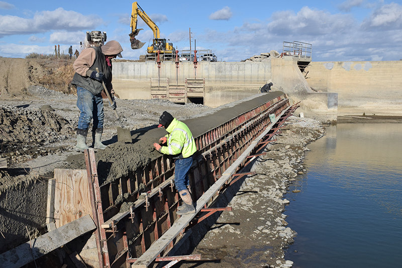 The Penrose Dam on the Shoshone River, near the Park/Big Horn County line, underwent concrete restructuring on Thursday as part of a Sidon Canal improvement project. Work was performed by Wilson Brothers Construction of Cowley on the diversion dam adjacent to gates of the Sidon Canal. Shoshone River waters were temporarily diverted around the construction site.
