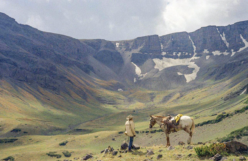 Bob Adams stands with his saddled horse in ‘Bathtub Basin’ of Jim Mountain, west of Cody, in September 1972. A Thursday Cody Culture Club event will cover the history of the namesakes of local landmarks like Jim Mountain.