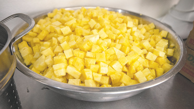 Last week’s menu at Hickory Street included pineapple. The business has partnered with other volunteers through the group Love Thy Neighbor — Powell to provide hundreds of meals.
