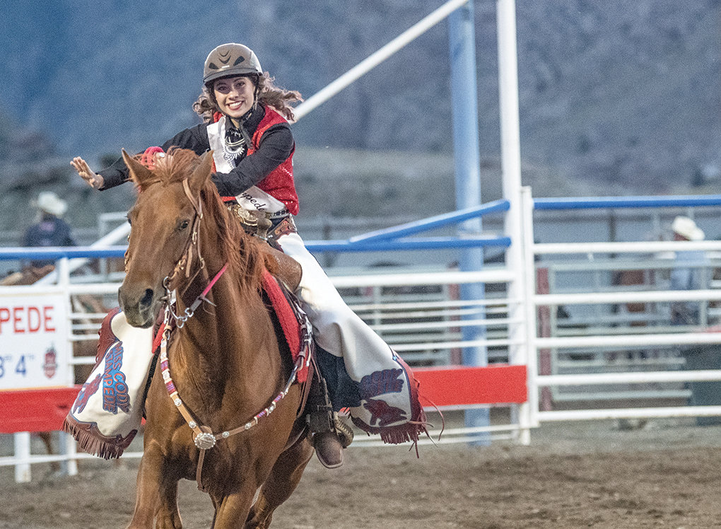 Rylee Ramsey rides into the Cody Stampede arena on Saturday for the first time since her accident last August. Ramsey will wear a helmet, instead of a cowboy hat with a tiara embellishment typical of most rodeo queens.